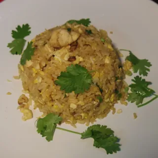 A plate of chicken fried rice