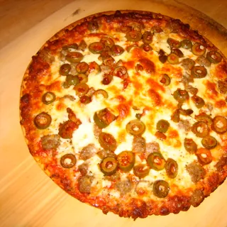 A sausage pizza with olives