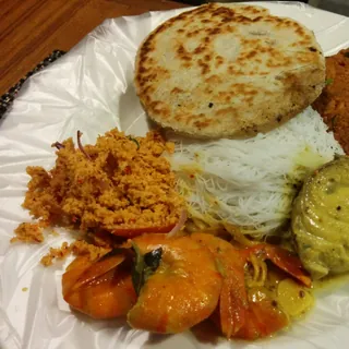Sri Lankan string hoppers served with curry and sambol